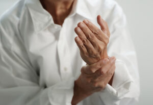 arthritis old person and Elderly woman female suffering from pain at home